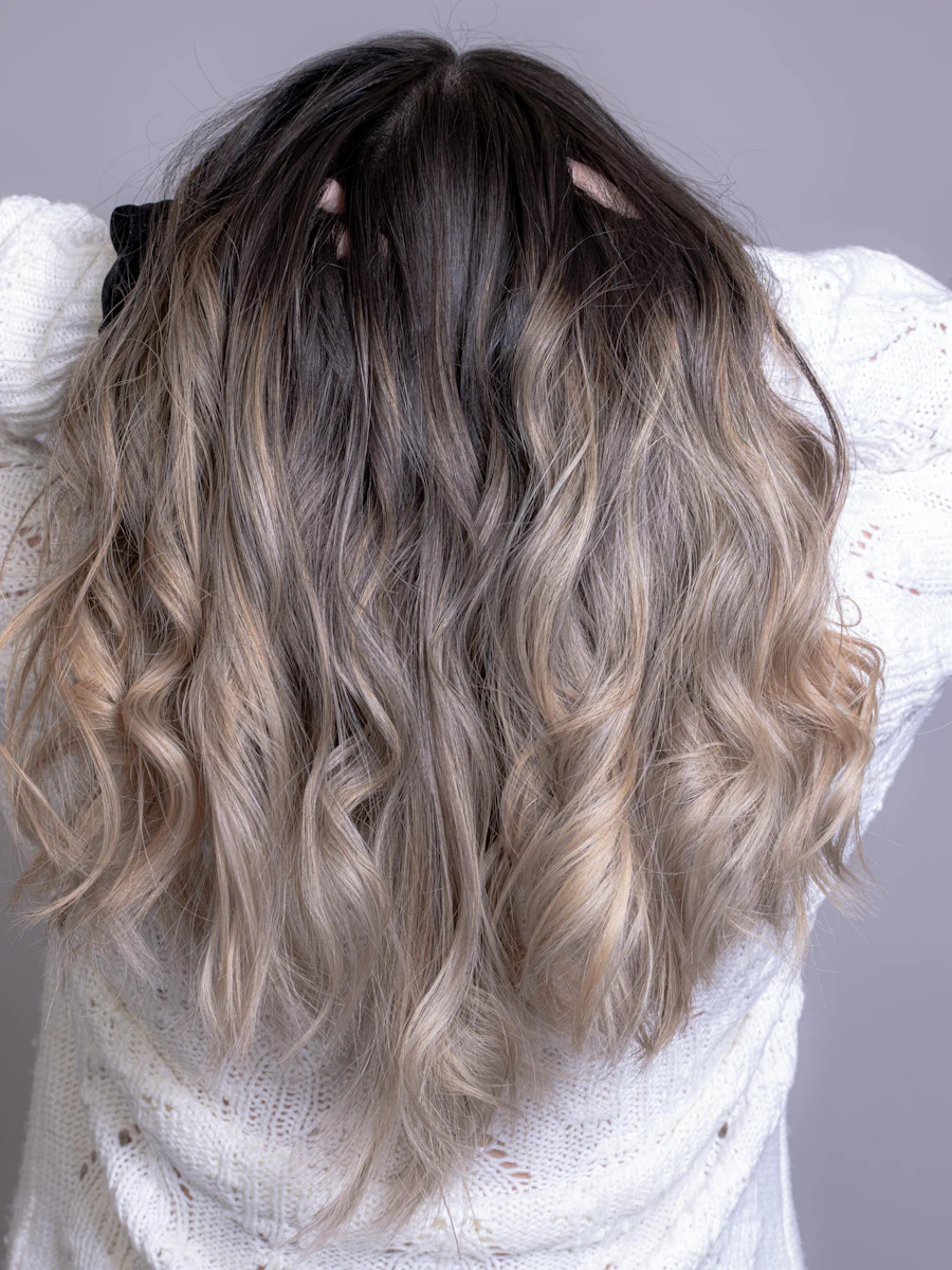 Hair color correction from box dye to healthy blonde at Salon Kreed in Colorado Springs